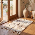 SAFAVIEH Moroccan Tassel Shag Collection Area Rug - 5'3" x 7'6", Ivory, Non-Shedding & Easy to Clean, Plush High-Low Texture, Ideal for Living Room, Bedroom, Dining Space (MTS688C)